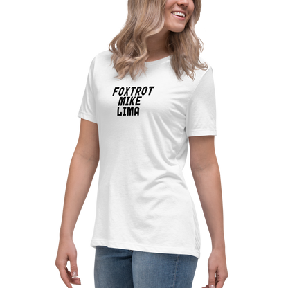 "Foxtrot Mike Lima" printed on a white women's relaxed t-shirt worn by a female