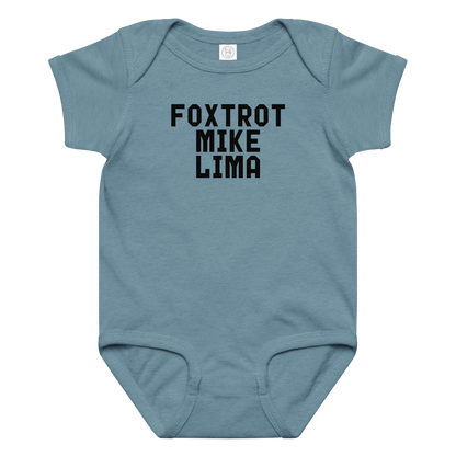 "Foxtrot Mike Lima" printed on a vintage indigo baby jersey bodysuit laying on a flat surface amongst other clothes