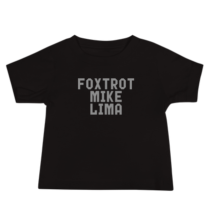 "Foxtrot Mike Lima" printed on a black baby jersey short sleeve tee laying on a flat surface