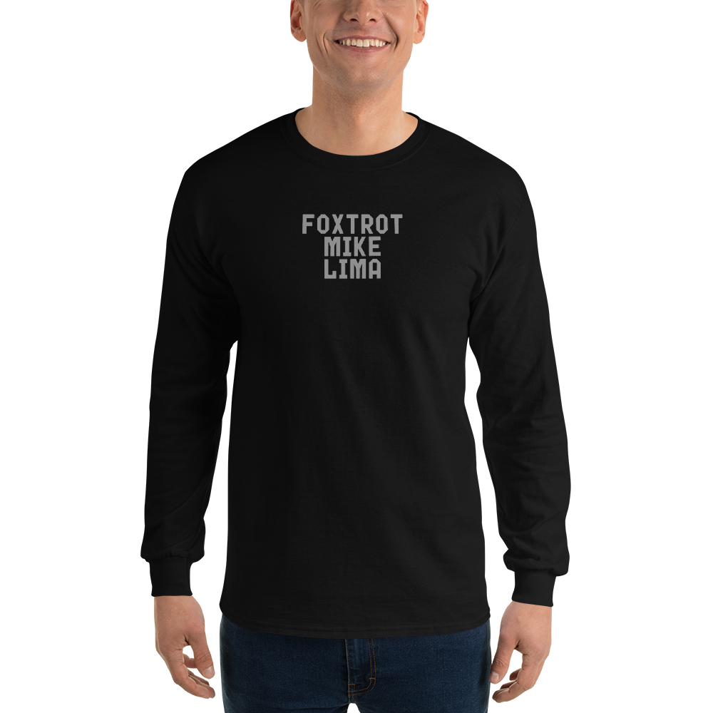 "Foxtrot Mike Lima" printed on a black men's long sleeve shirt worn by a male