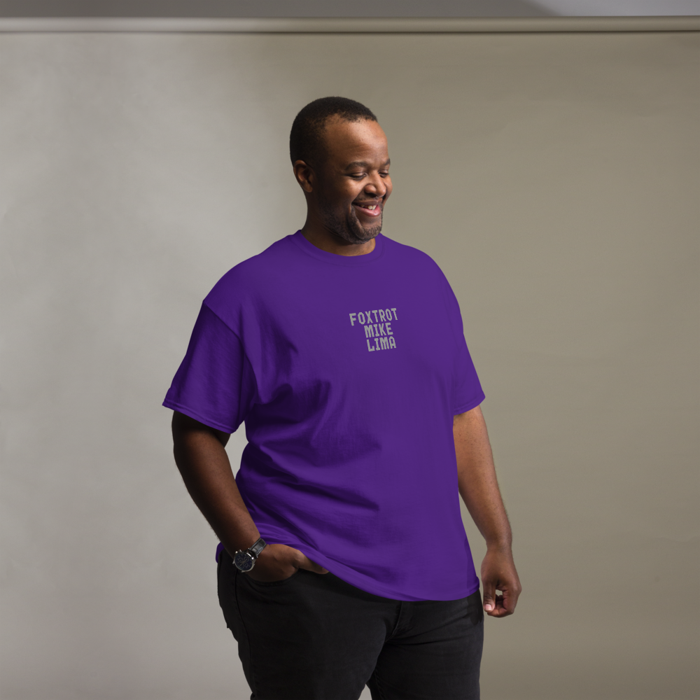 "Foxtrot Mike Lima" printed on a purple unisex classic tee worn by a male