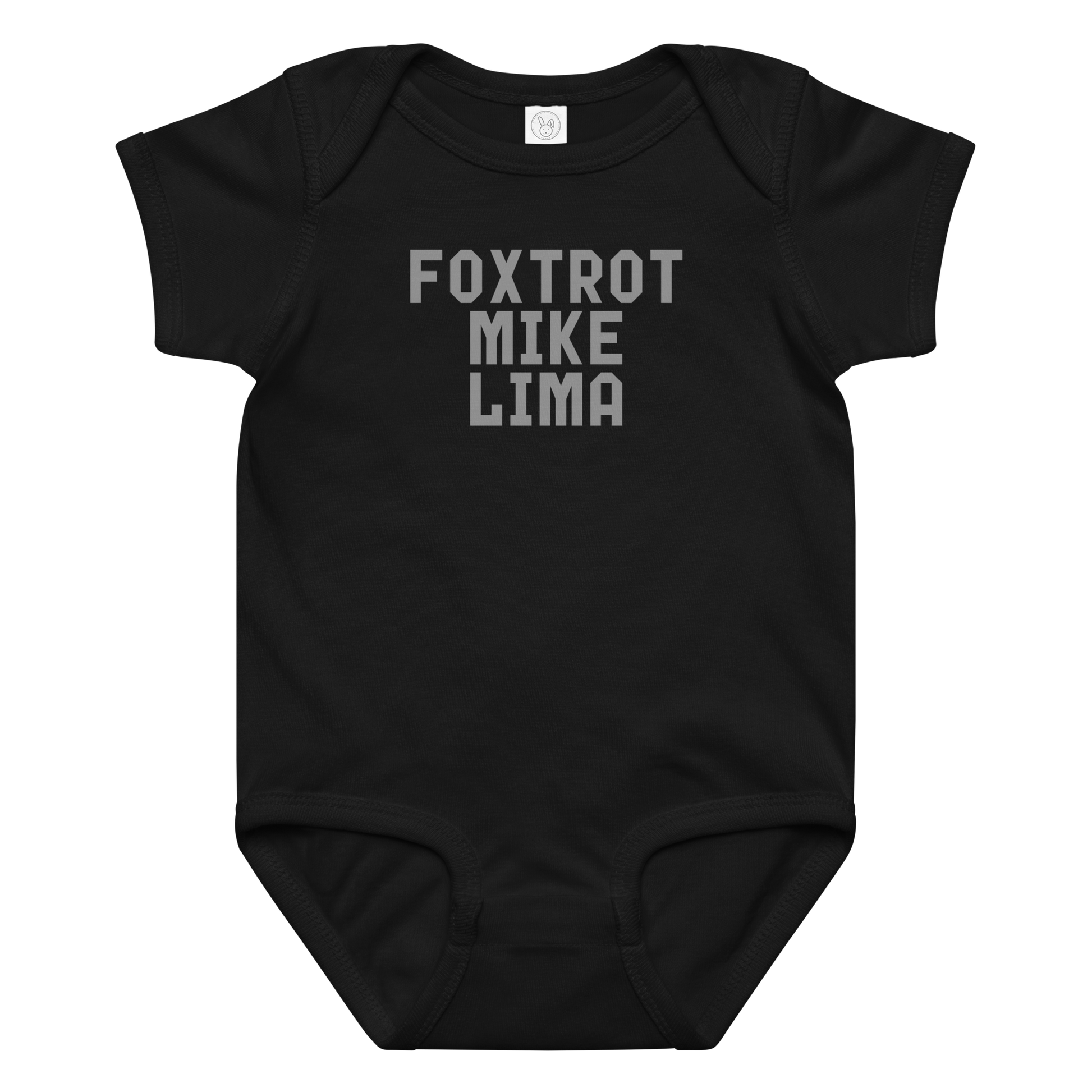 "Foxtrot Mike Lima" printed on a black baby jersey bodysuit laying on a flat surface amongst other clothes