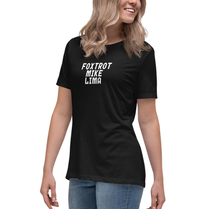"Foxtrot Mike Lima" printed on a black women's relaxed t-shirt worn by a female