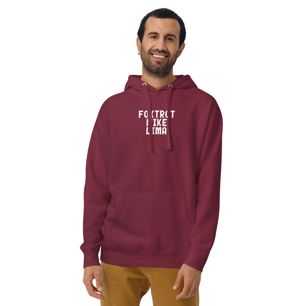 "Foxtrot Mike Lima" printed on a maroon warn by a male