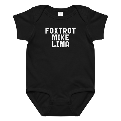 "Foxtrot Mike Lima" printed on a black baby jersey bodysuit laying on a flat surface amongst other clothes