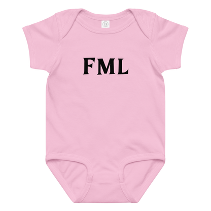 "FML" printed on a pink baby jersey bodysuit laying on a flat surface amongst other clothes