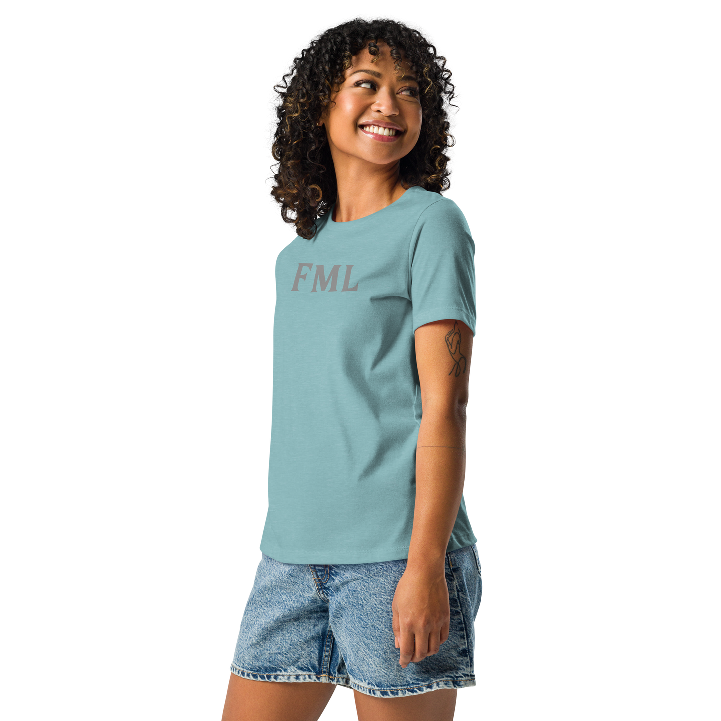 "FML" printed on a heather blue lagoon women's relaxed t-shirt worn by a female