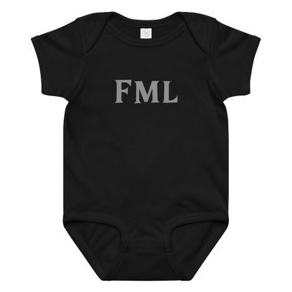 "FML" printed on a black baby jersey bodysuit laying on a flat surface amongst other clothes