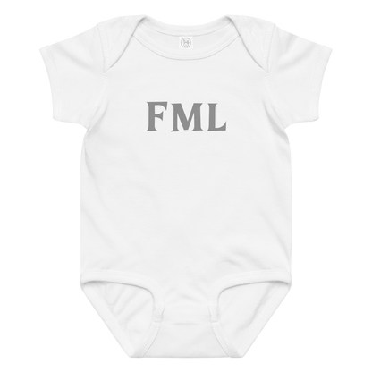 "FML" printed on a white baby jersey bodysuit laying on a flat surface amongst other clothes