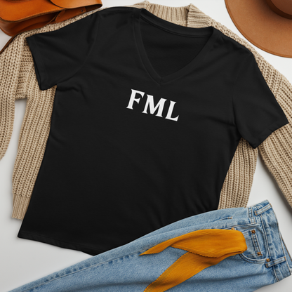 "FML" printed on a solid black blend women's relaxed v-neck t-shirt laying on a flat surface amongst other clothes