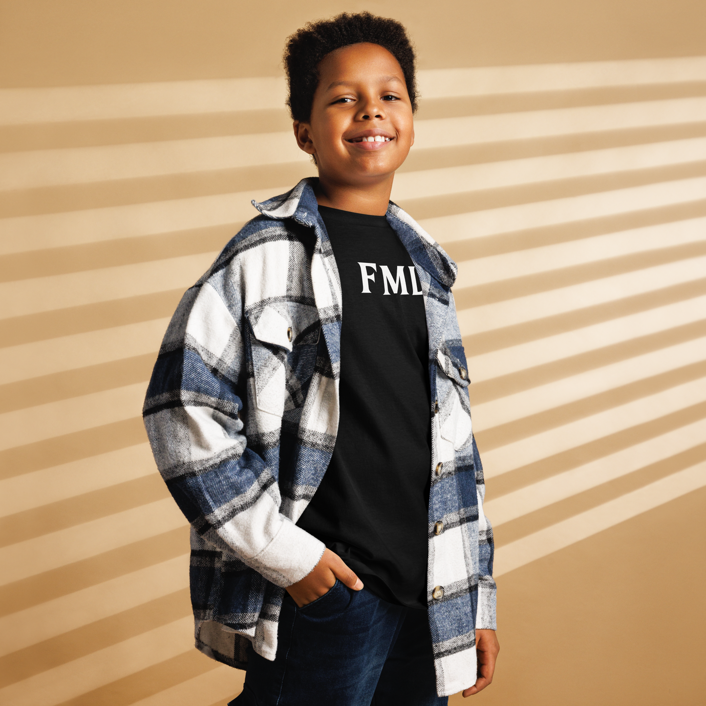 "FML" printed on a black youth classic tee worn by a male also wearing a jacket