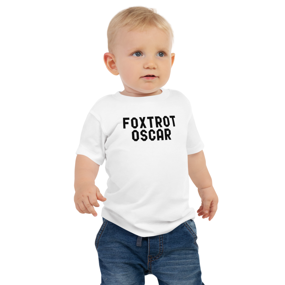 "Foxtrot Oscar" printed on a white baby jersey short sleeve tee worn by a male