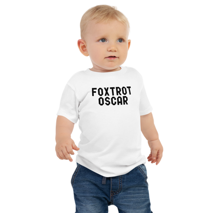"Foxtrot Oscar" printed on a white baby jersey short sleeve tee worn by a male