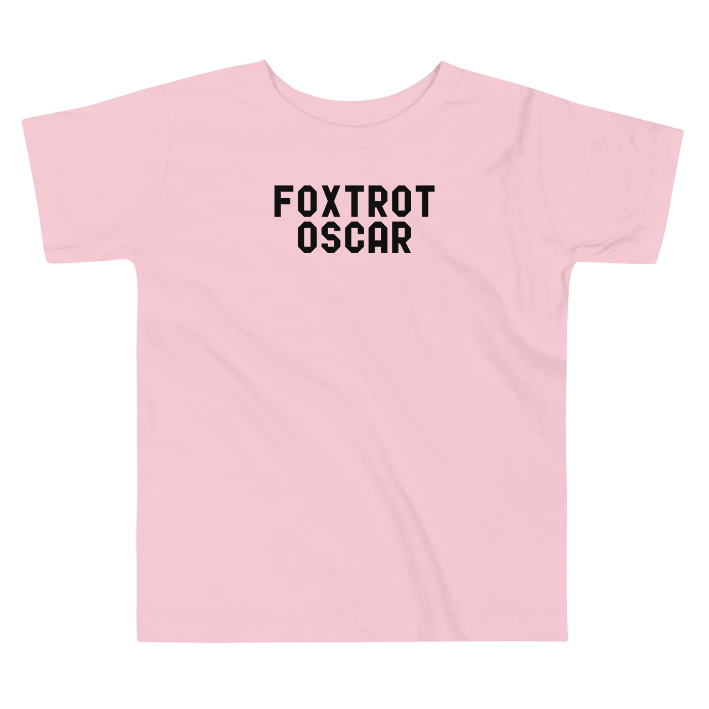 "Foxtrot Oscar" printed on a pink toddler short sleeve tee laying on a flat surface