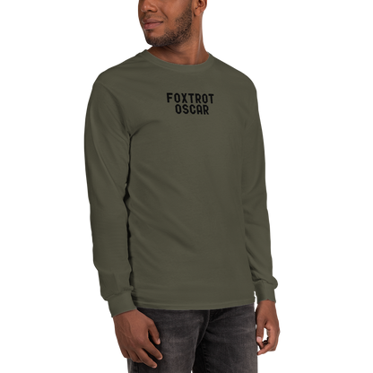 "Foxtrot Oscar" printed on a military green men's long sleeve shirt worn by a male