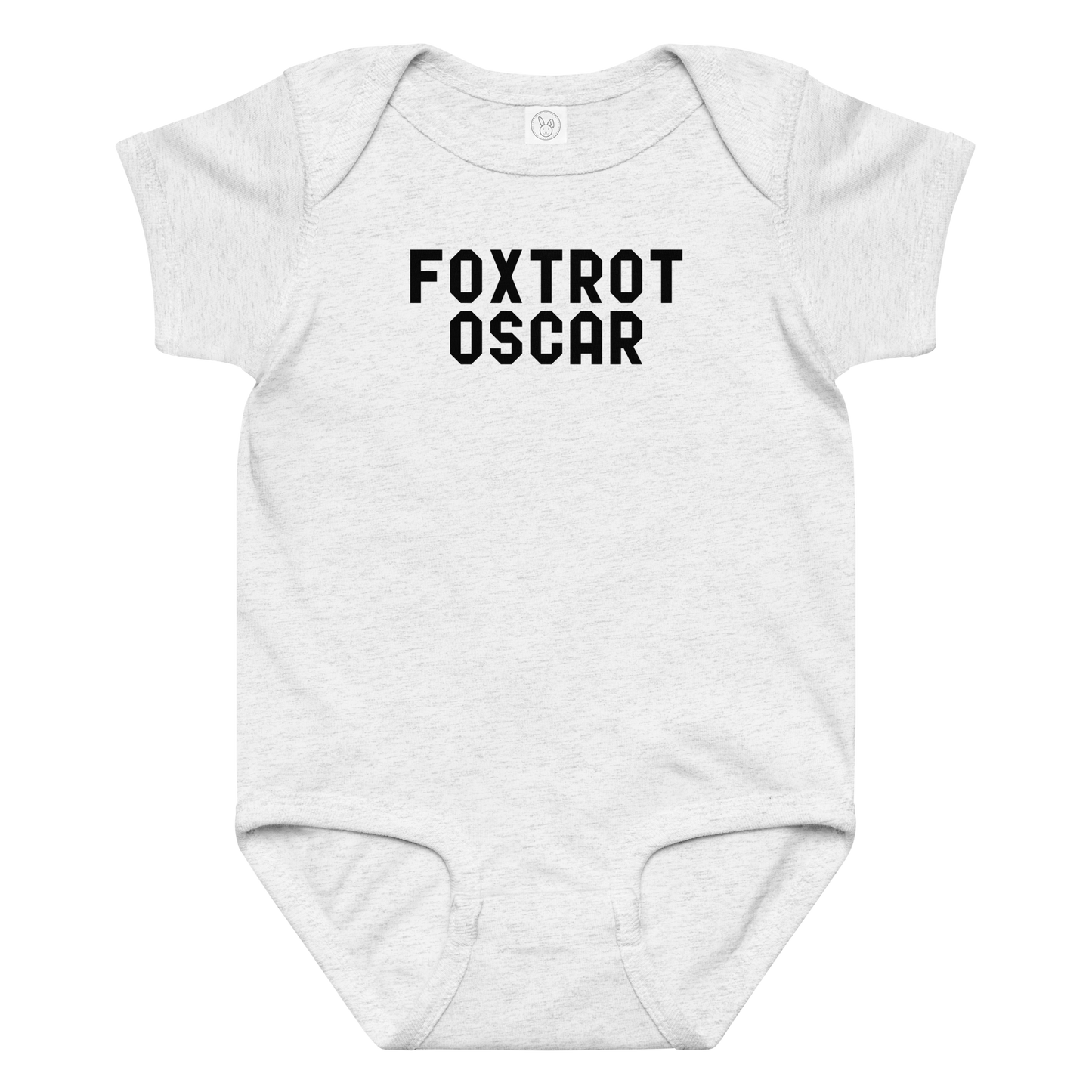 "Foxtrot Oscar" printed on a ash baby jersey bodysuit laying on a flat surface amongst other clothes