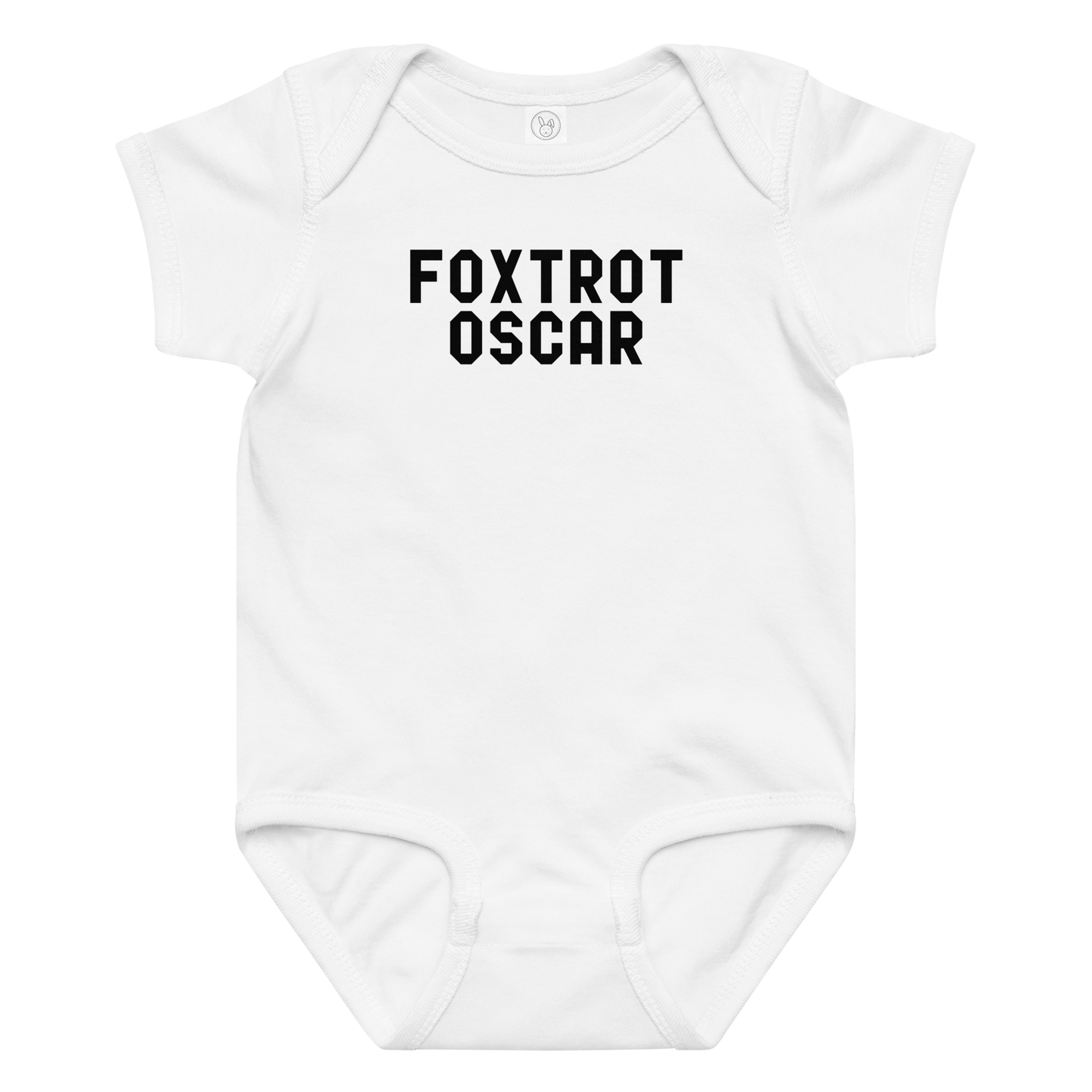 "Foxtrot Oscar" printed on a white baby jersey bodysuit laying on a flat surface amongst other clothes