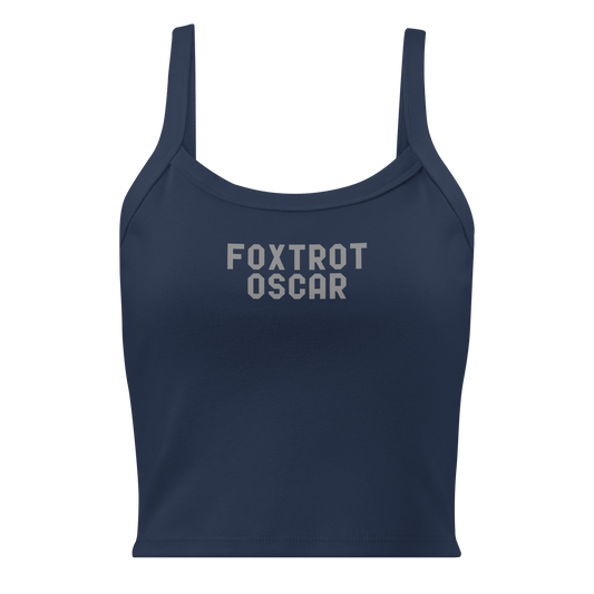 "Foxtrot Oscar" printed on a solid navy blend women's micro-rib tanktop laying on a flat surface