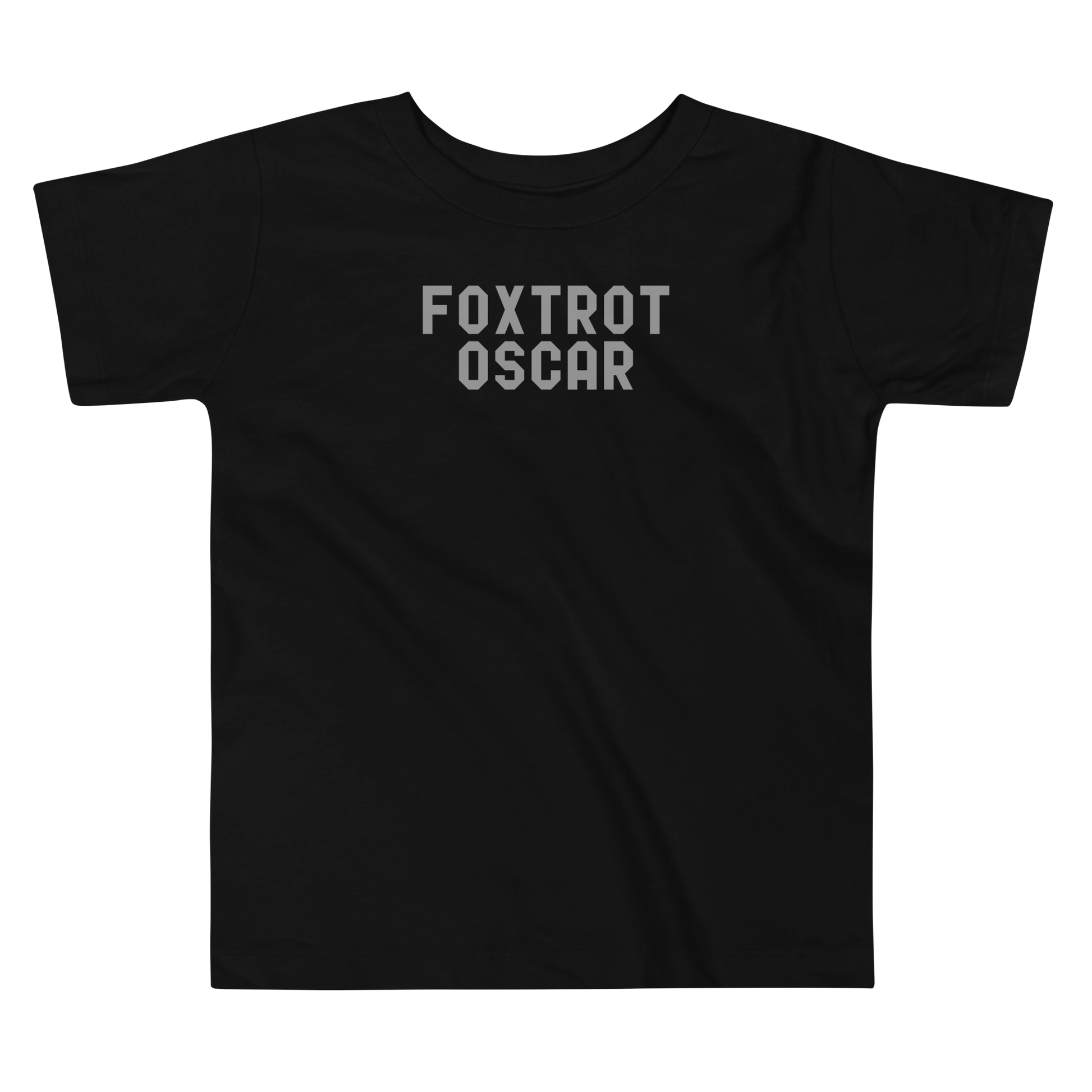 "Foxtrot Oscar" printed on a black toddler short sleeve tee laying on a flat surface