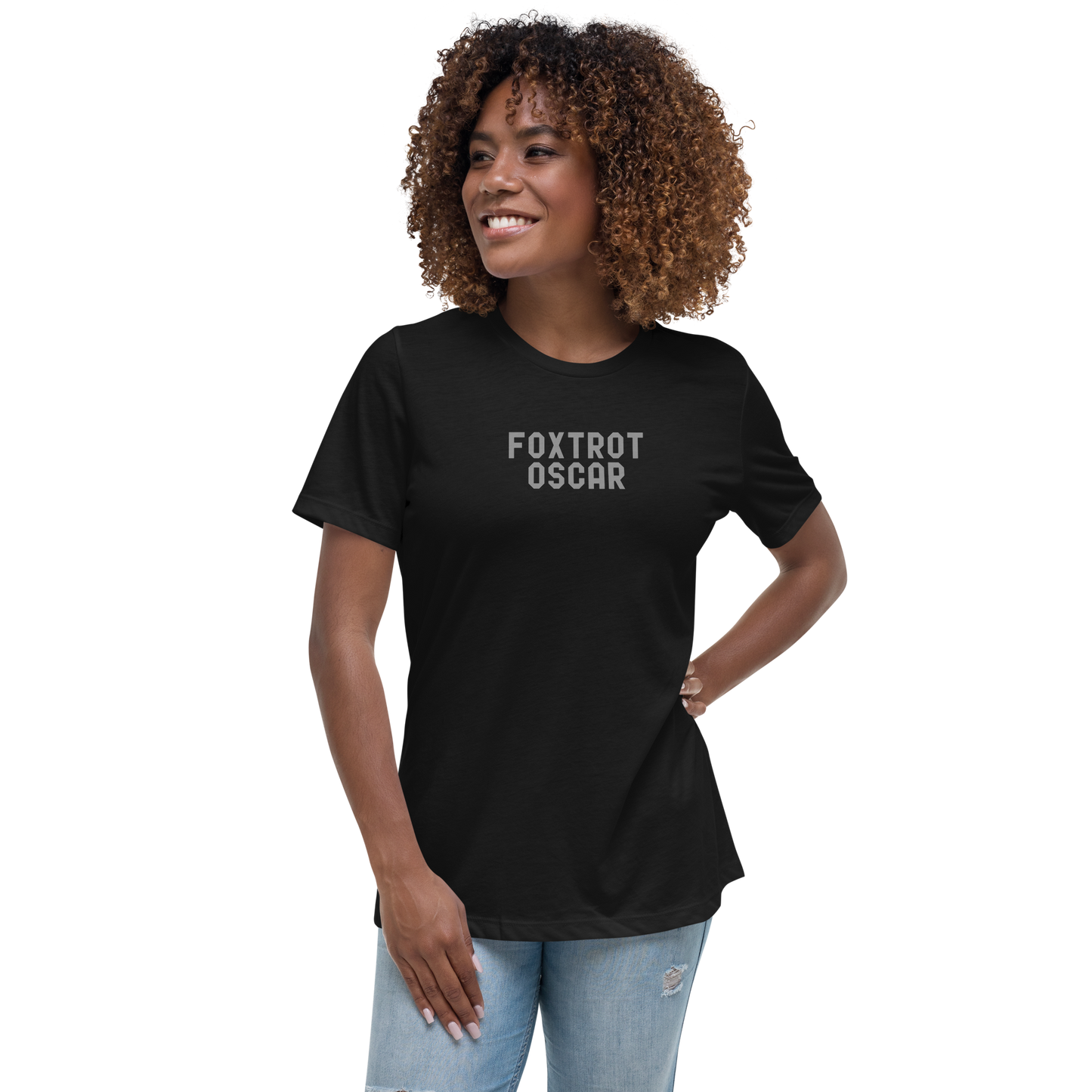 "Foxtrot Oscar" printed on a black women's relaxed t-shirt worn by a female