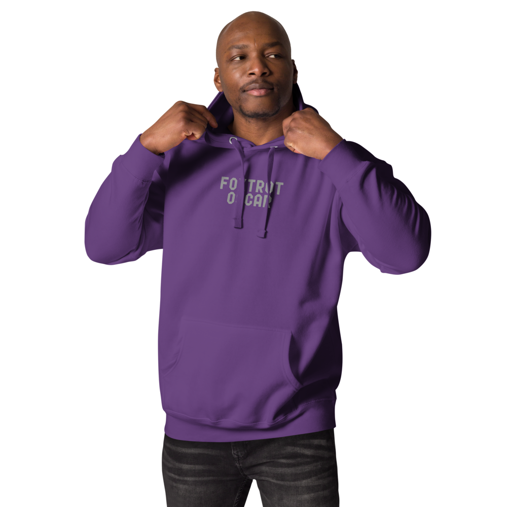 "Foxtrot Oscar" printed on a purple unisex hoodie worn by a male