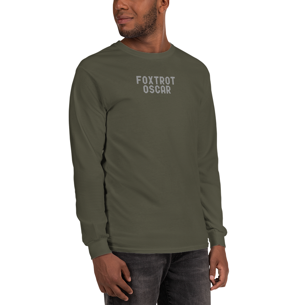 "Foxtrot Oscar" printed on a military green men's long sleeve shirt worn by a male