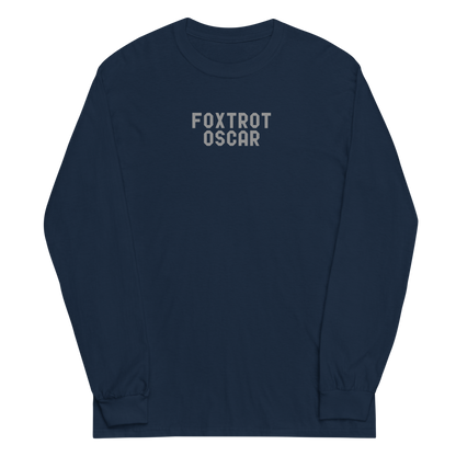 "Foxtrot Oscar" printed on a navy men's long sleeve shirt laying on a flat surface