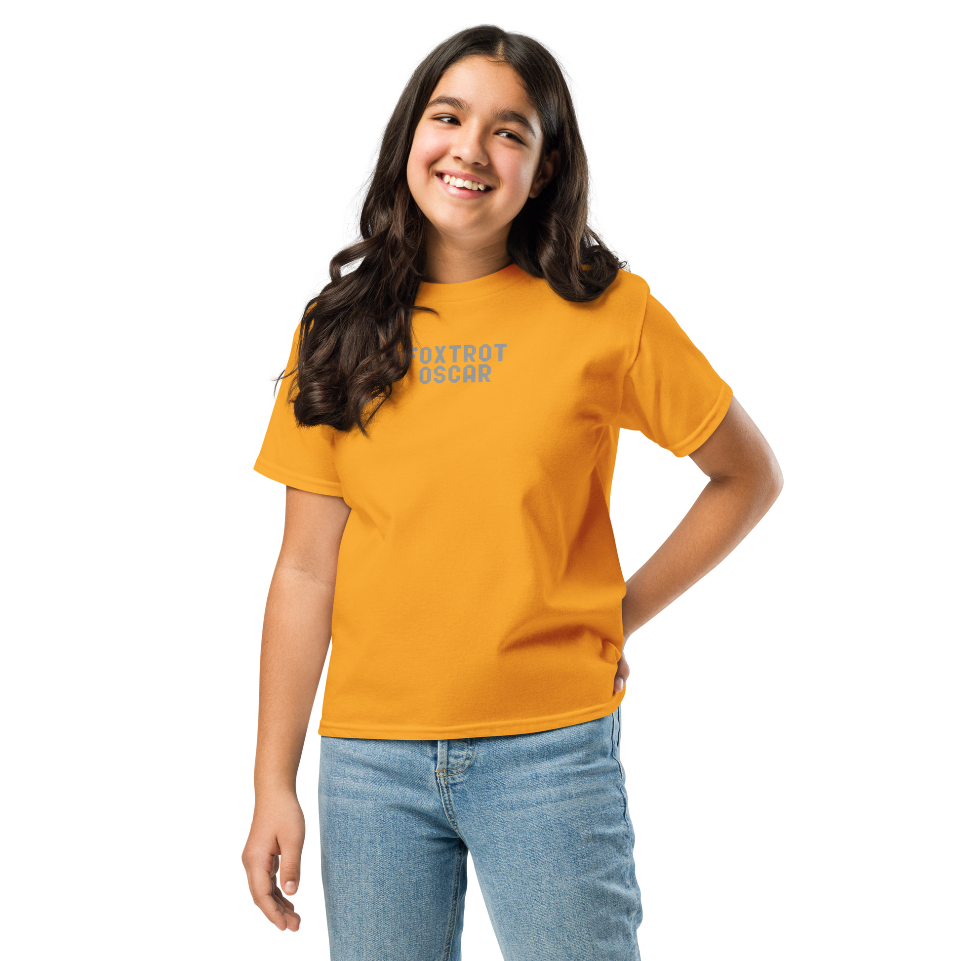 "Foxtrot Oscar" printed on a gold youth classic tee worn by a female