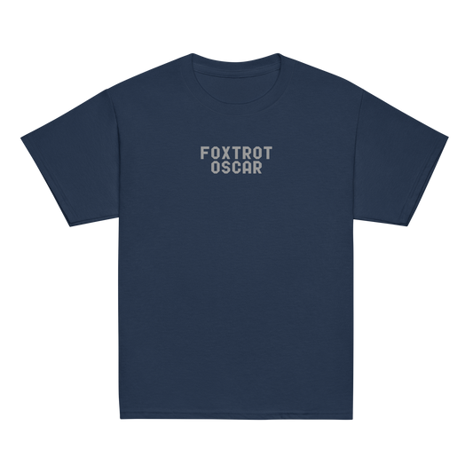 "Foxtrot Oscar" printed on a navy youth classic tee laying on a flat surface