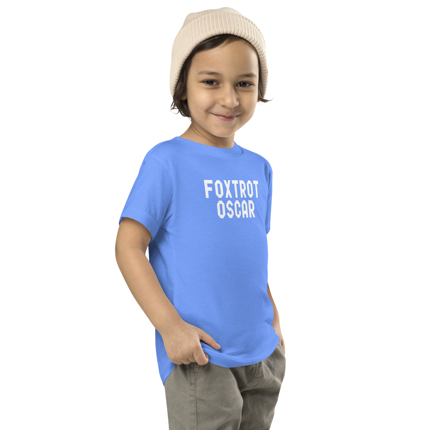 "Foxtrot Oscar" printed on a heather columbia blue toddler short sleeve tee worn by a male who is also wearing a knit cap