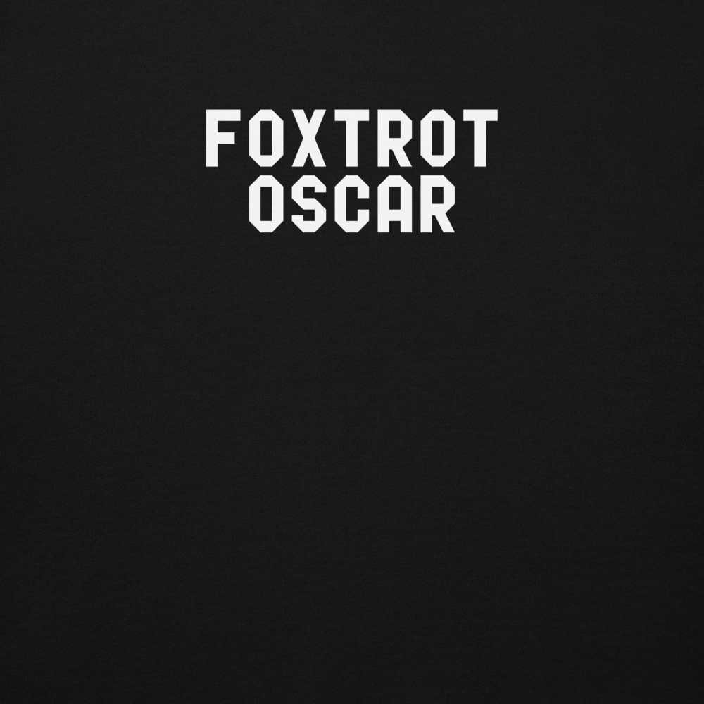 "Foxtrot Oscar" printed on a black background