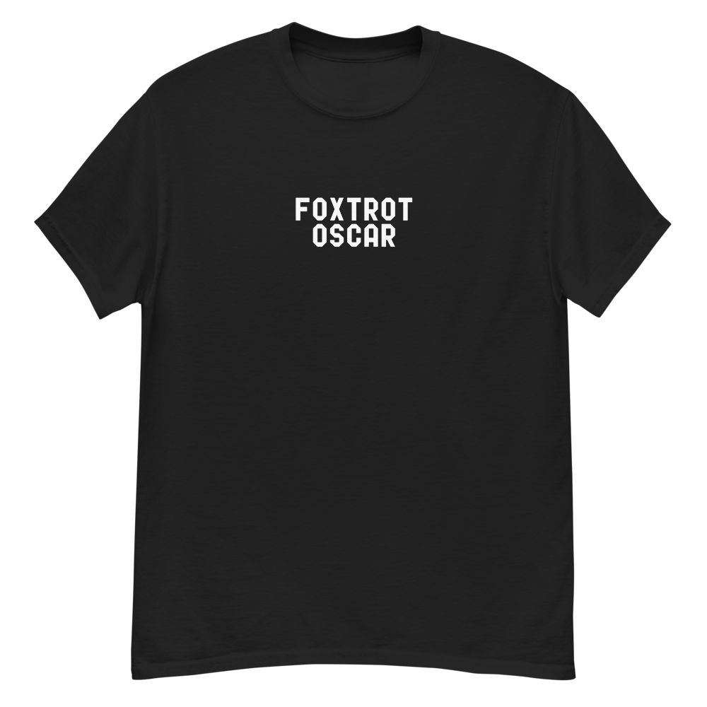 "Foxtrot Oscar" printed on a black unisex classic tee laying on a flat surface