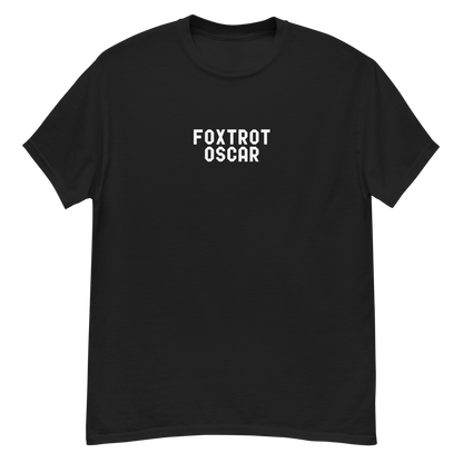 "Foxtrot Oscar" printed on a black unisex classic tee laying on a flat surface