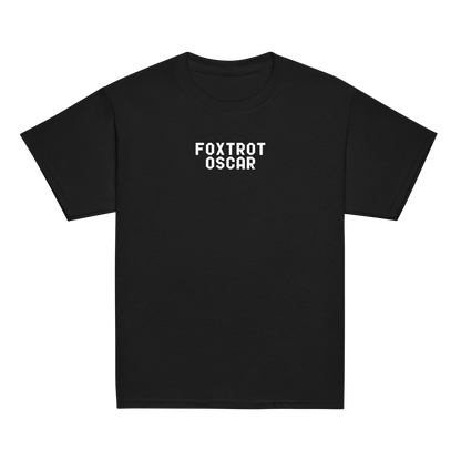 "Foxtrot Oscar" printed on a black youth classic tee laying on a flat surface