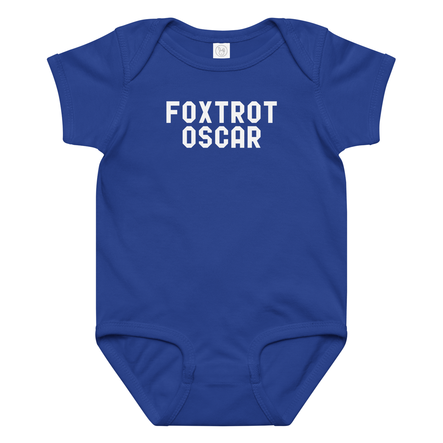 "Foxtrot Oscar" printed on a royal baby jersey bodysuit laying on a flat surface amongst other clothes