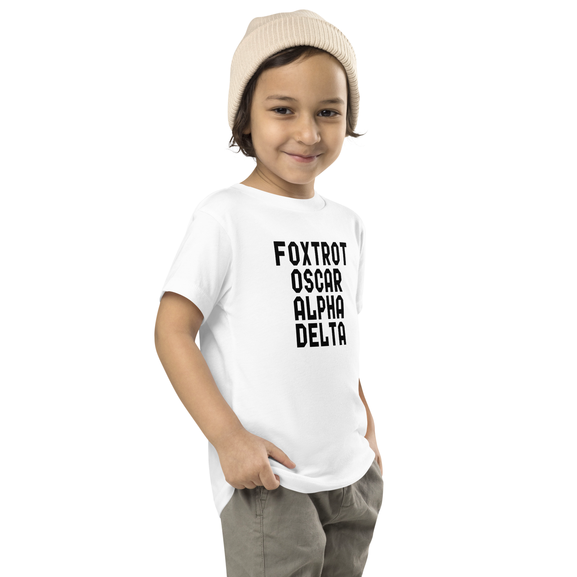 "Foxtrot Oscar Alpha Delta" printed on a white toddler short sleeve tee worn by a male who is also wearing a knit cap