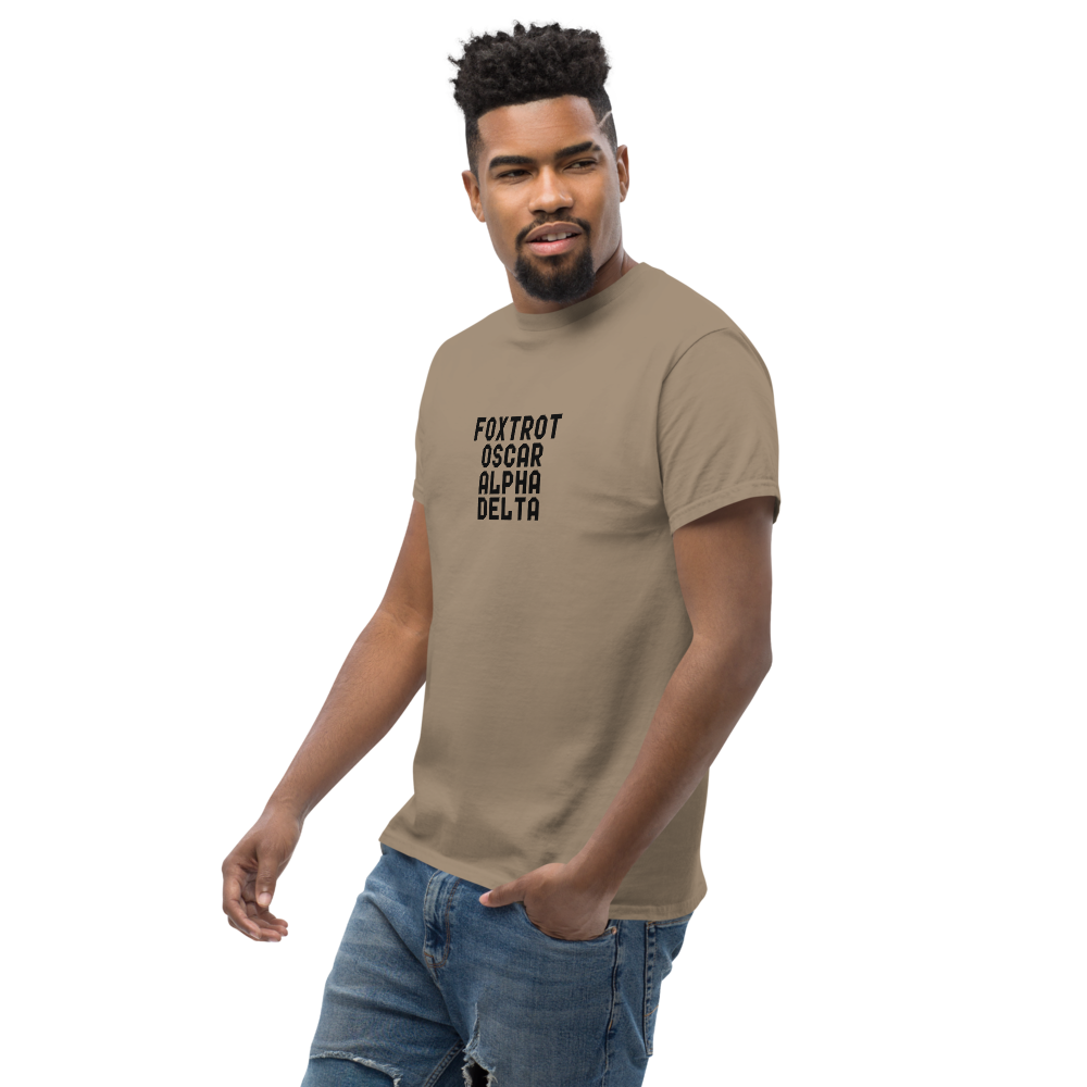 "Foxtrot Oscar Alpha Delta" printed on a brown savana unisex classic tee worn by a male