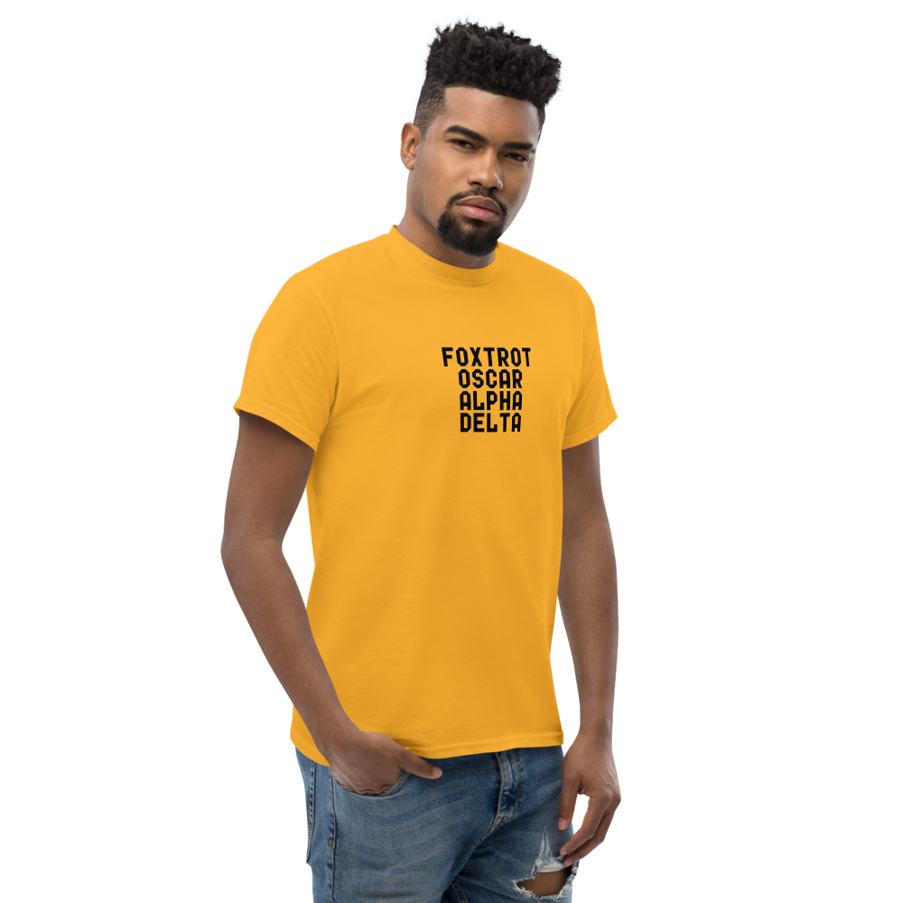 "Foxtrot Oscar Alpha Delta" printed on a gold unisex classic tee worn by a male