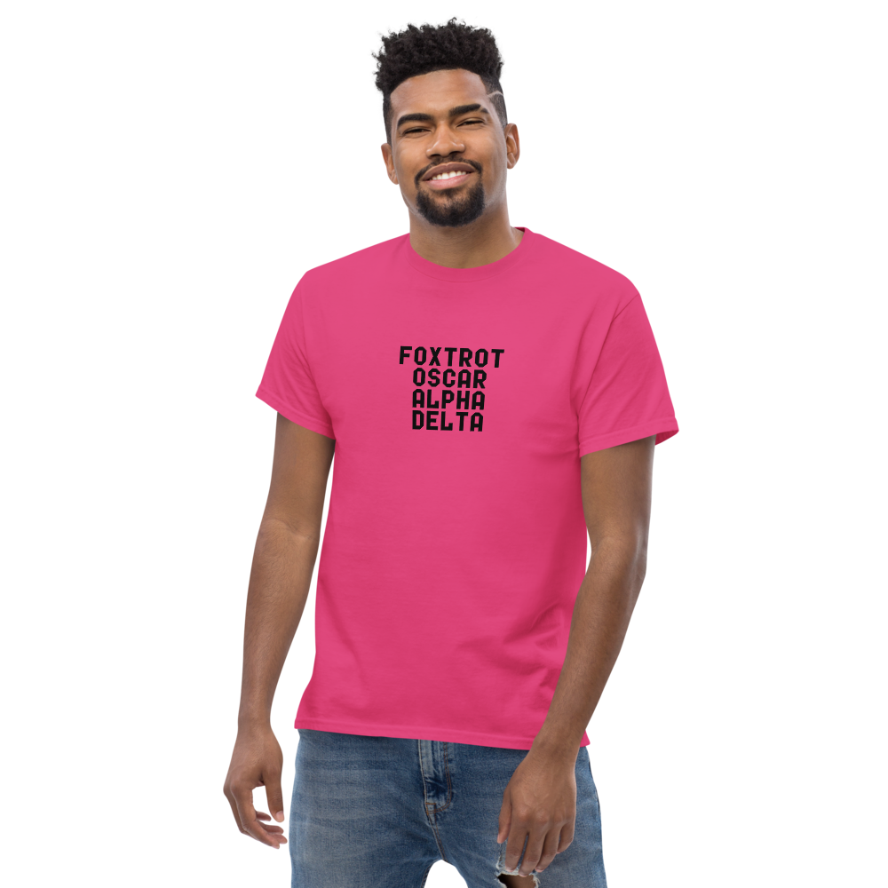"Foxtrot Oscar Alpha Delta" printed on a heliconia unisex classic tee worn by a male