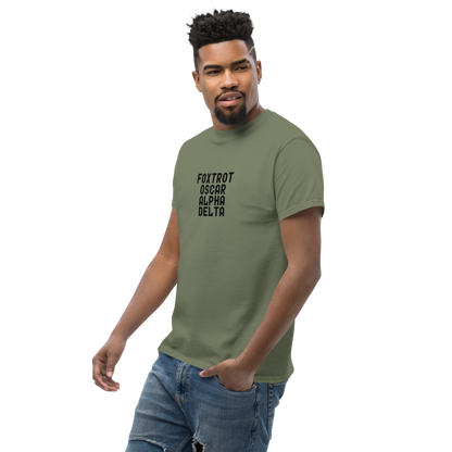 "Foxtrot Oscar Alpha Delta" printed on a military green unisex classic tee worn by a male