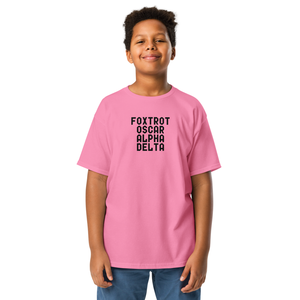"Foxtrot Oscar Alpha Delta" printed on a azalea youth classic tee worn by a male