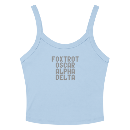 "Foxtrot Oscar Alpha Delta" printed on a solid baby blue blend women's micro-rib tanktop laying on a flat surface amongst sunglasses and shorts