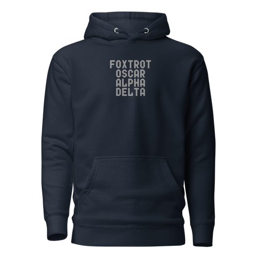 "Foxtrot Oscar Alpha Delta" printed on a navy blazer on an invisible / simulated body