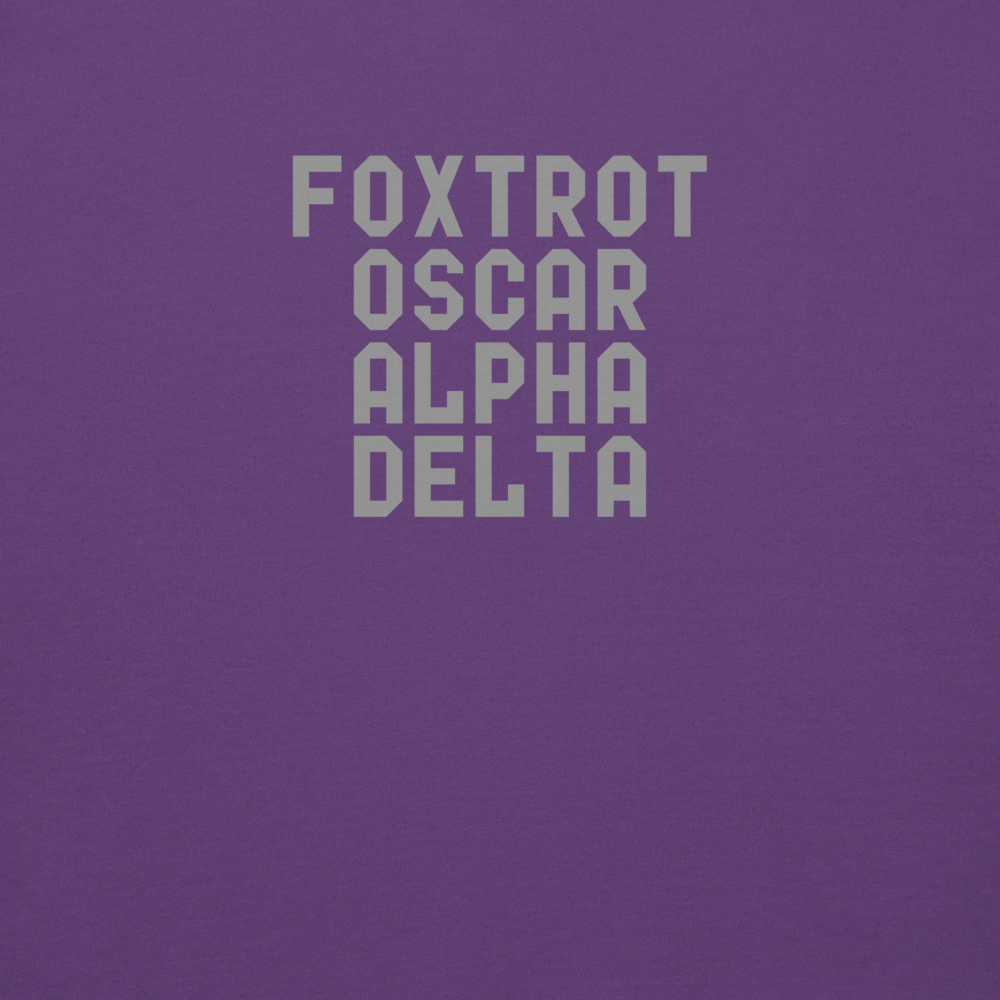 "Foxtrot Oscar Alpha Delta" printed on a purple background