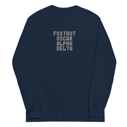 "Foxtrot Oscar Alpha Delta" printed on a navy men's long sleeve shirt laying on a flat surface