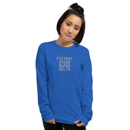 "Foxtrot Oscar Alpha Delta" printed on a royal men's long sleeve shirt worn by a female