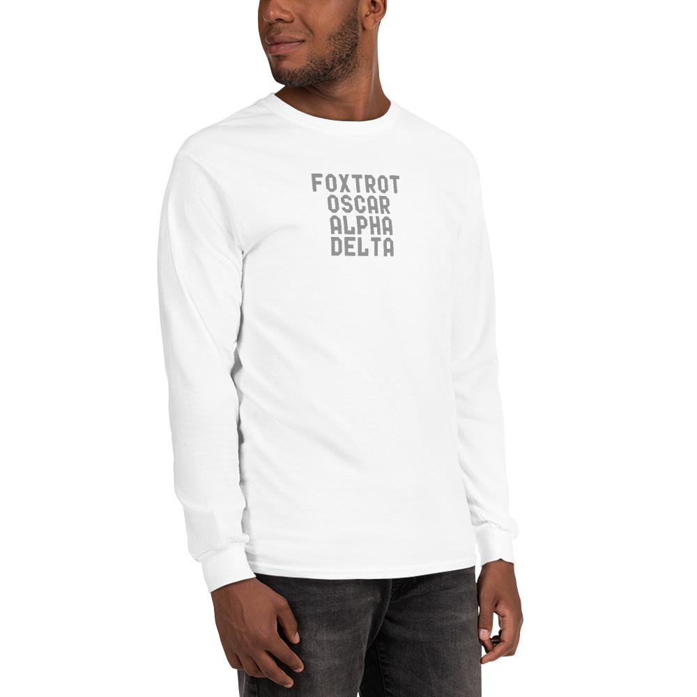 "Foxtrot Oscar Alpha Delta" printed on a white men's long sleeve shirt worn by a male