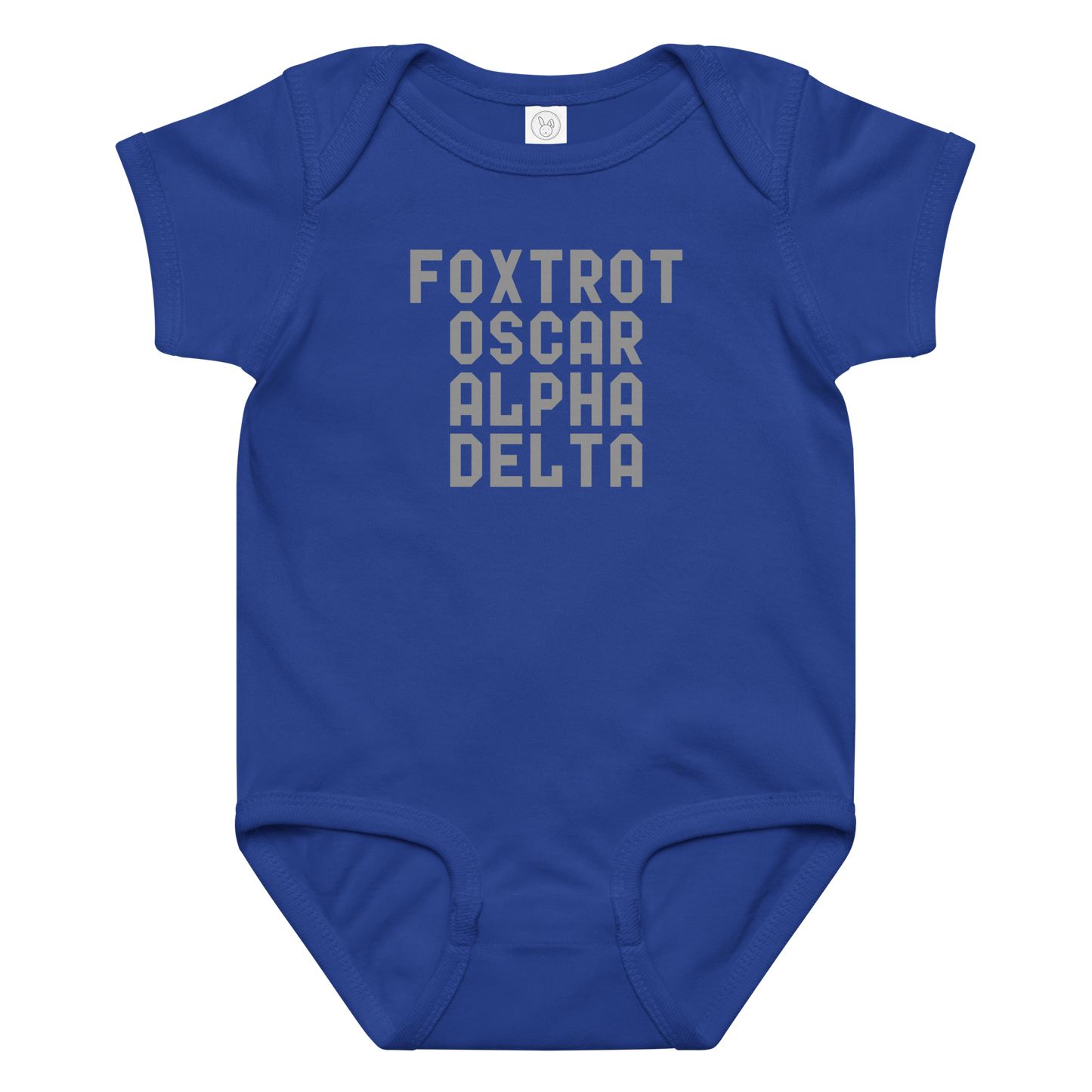 "Foxtrot Oscar Alpha Delta" printed on a royal baby jersey bodysuit laying on a flat surface amongst other clothes