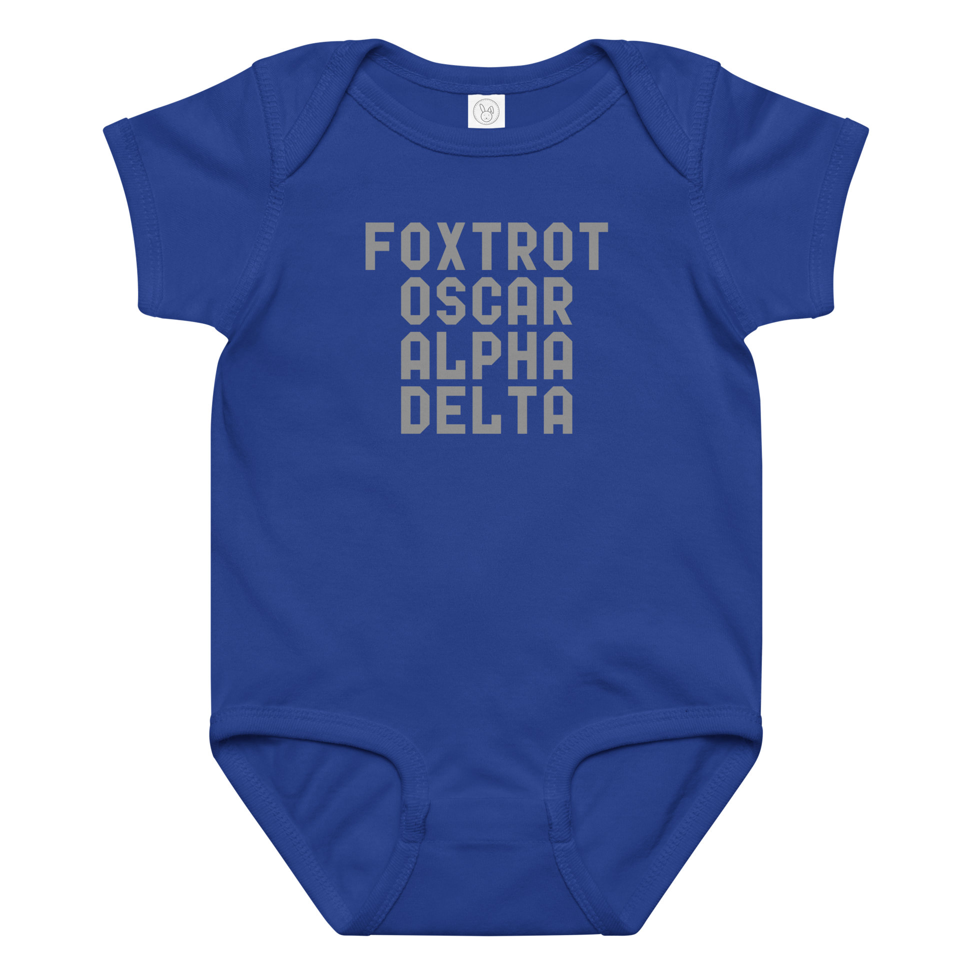"Foxtrot Oscar Alpha Delta" printed on a royal baby jersey bodysuit laying on a flat surface amongst other clothes