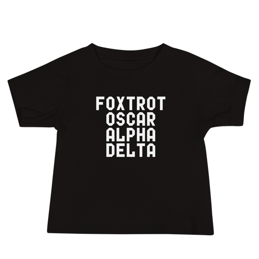"Foxtrot Oscar Alpha Delta" printed on a black baby jersey short sleeve tee laying on a flat surface